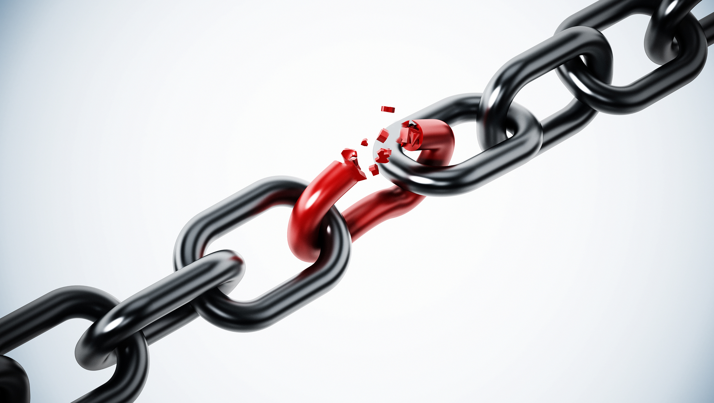 black chain links connected, with a single red chain broken, demonstrating the ineffectiveness of the supply chain if one partner in the chain fails to properly communicate.